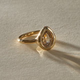 Aurum one of a kind ring with a 1.35ct champagne salt and pepper pear rose cut diamond in a soft 14k recycled gold bezel.