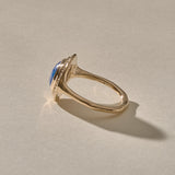 Cleo Lapis Lazuli Amulet Ring in gold from the side, showing the raised setting.