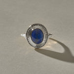 Cleo Lapis Lazuli Amulet Ring in sterling silver from the front, showing the deep blue lapis with golden flecks.