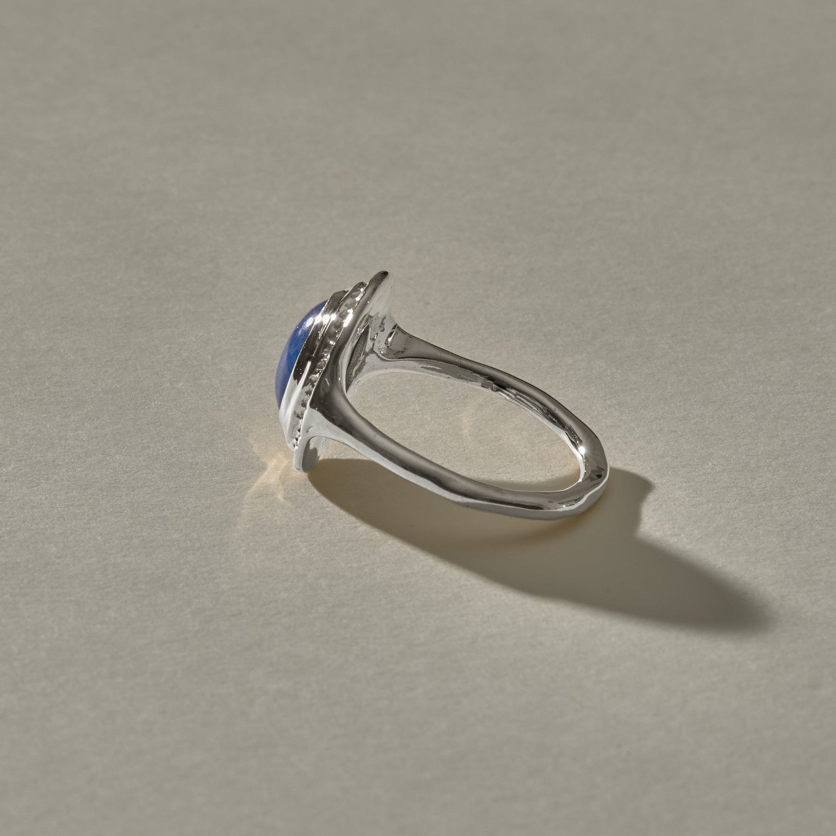 Cleo Lapis Lazuli Amulet Ring in sterling silver from the side, showing the slim band.