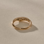 Eros Five-Stone Champagne Diamond Band in solid recycled gold from the back, showing the open settings.