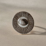 Heart of the Sun Statement Ring in recycled sterling silver from the front, showing the round sunburst face.