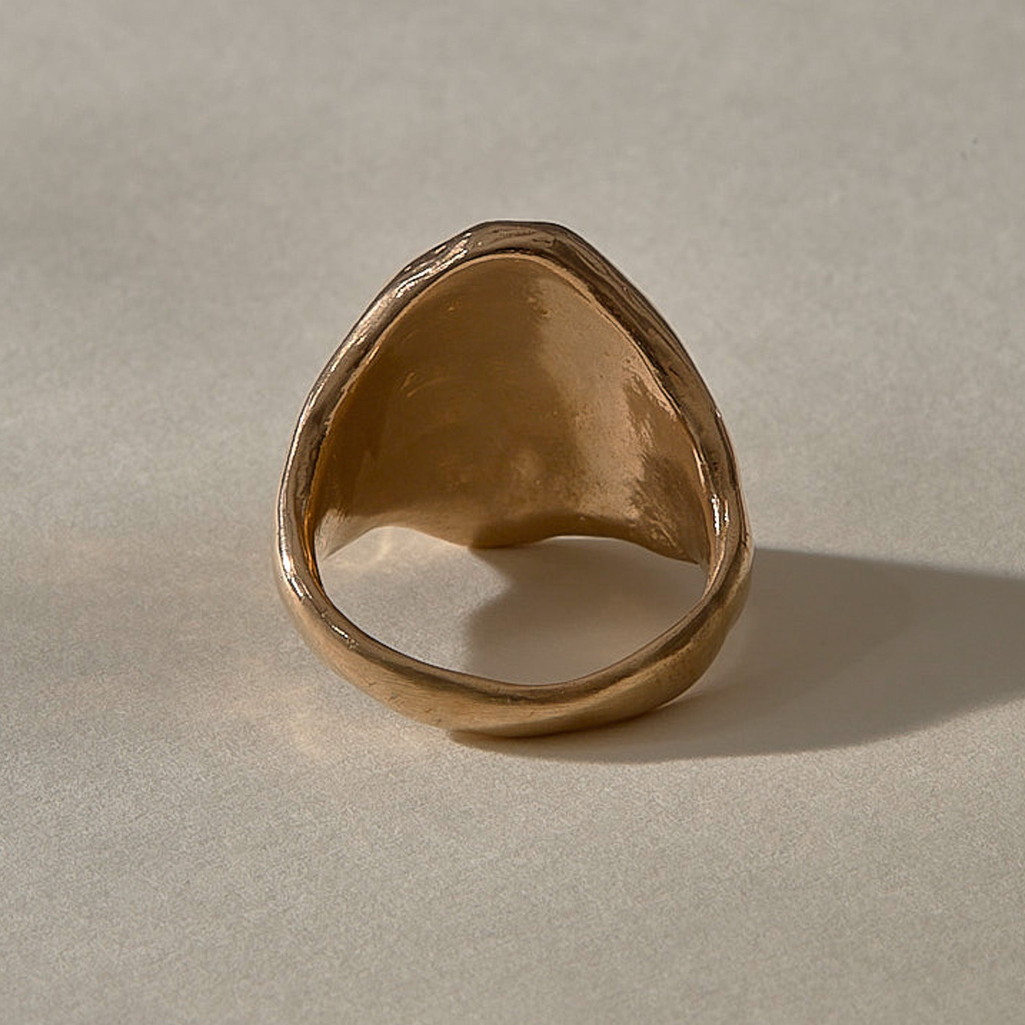 Heritage Textured Signet Ring in recycled bronze from the back, showing the smooth inside of the band.