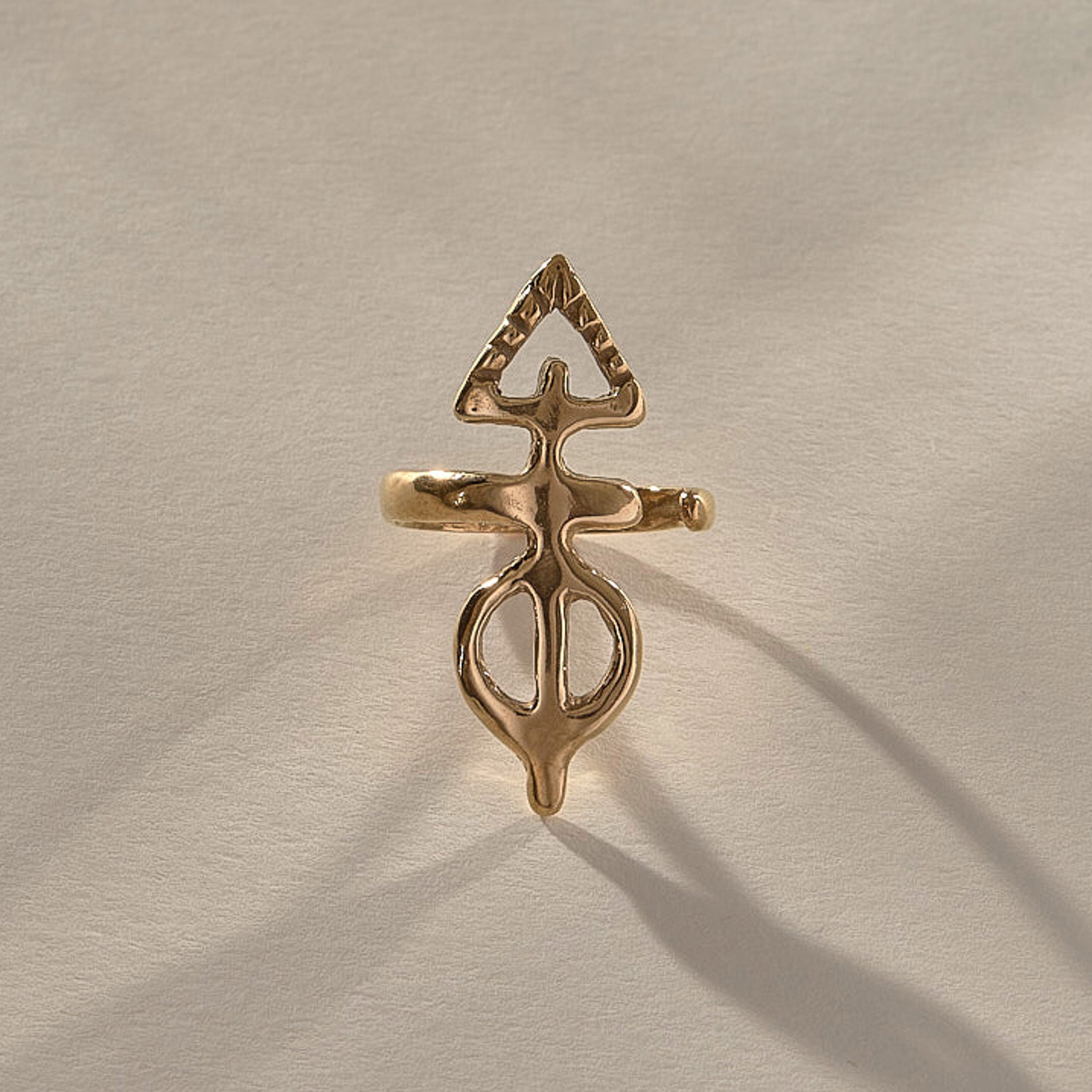 Ma'at Elemental Ring in solid recycled gold, front view of the hand-carved Egyptian goddess amulet ring