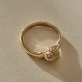 Maré Ring in solid recycled gold, back view showing the shell from behind