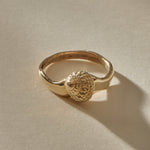 Maré Shell Ring in solid recycled gold, a hand-cast textured seashell on an organic band.