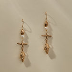 Sereia Shell and Pearl Chandelier Earrings in recycled bronze, a pearl and cast spiral seashell drop on gold fill hooks.
