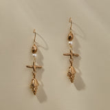 Sereia Shell and Pearl Chandelier Earrings in recycled bronze, a pearl and cast spiral seashell drop on gold fill hooks.
